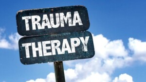 Trauma Therapy sign with sky background